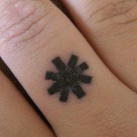 Black, bold snowflake sign hand tattoo