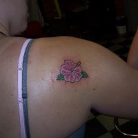 Small pink hibiscus tattoo
