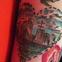 Skyscrapers in heart tattoo