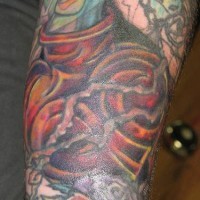 Heart themed arm tattoo