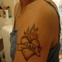 Lover name heart tattoo on arm