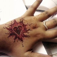 Broken heart tattoo on hand