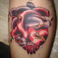 Super realistic heart tattoo on leg