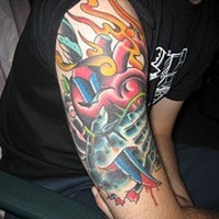 Heart with dagger and flames coloured tattoo