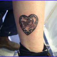 Heart shaped pattern tattoo