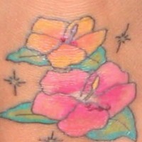 Cartoonish hibiscus flowers tattoo