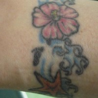 Hibiscus in sea armband tattoo