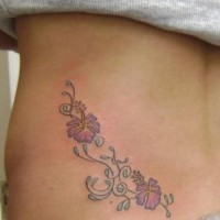 Hibiscus tattoo on side
