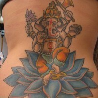 Ganesha dancing on blue lotus tattoo