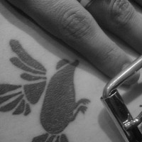 Black, strange bird -rat, wings hip tattoo
