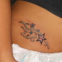 Different stars, curls, designed hip tattoo stars