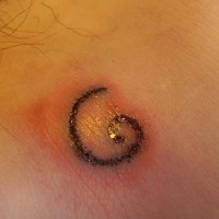 Homemade spiral tattoo