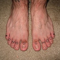 Home made foot fingers tattoo