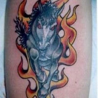 Angry horse in flames tattoo