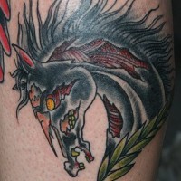Black zombie horse head tattoo