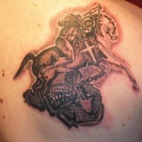 Horseman slaying serpent tattoo