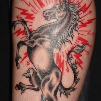 Black horse in red shining tattoo