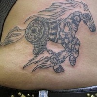 Tribal style riding horse tattoo