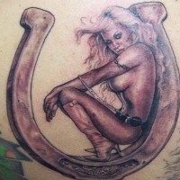 Horseshoe and sexy lady tattoo