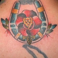 Horseshoe with red rose tattoo