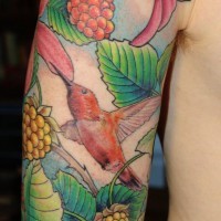 Exotic flowers and hummingbird tattoo