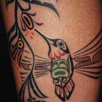 Cool tribal style hummingbird tattoo