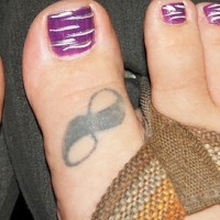 Infinity symbol tattoo on big toe