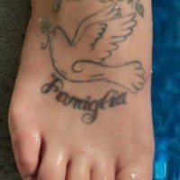 Italian tattoo with dove on foot