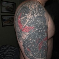 Black asian dragon tattoo