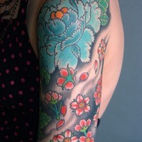 Asian flowers coloured artwork tattoo