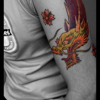 Coloured flying japanese dragon tattoo