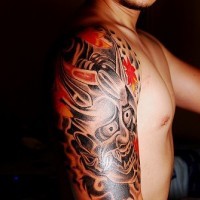 stupefacentedemonio giapponese sul braccio tatuaggio