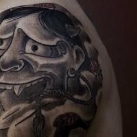 Japanese demon face tattoo
