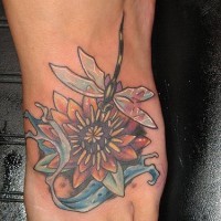 Lotus and dragonfly  tattoo on foot