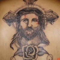 Jesus cross and rose tattoo