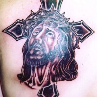 Jesus pain with cross tattoo