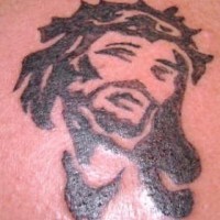Minimalistic jesus black ink tattoo