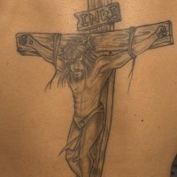 Jesus crucifixion black ink tattoo