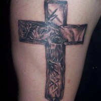 Jesus in cross tattoo