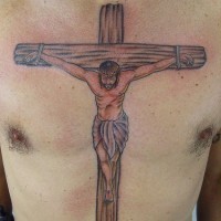 Jesus crucifixion coloured tattoo on chest