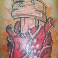 Heart with wooden cross tattoo