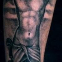 Jesus on cross black ink tattoo