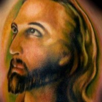 Gesicht des Jesuses schlechte farbige Tätowierung