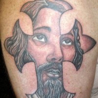 Jesus under cross tattoo