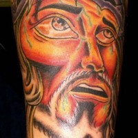 Surreal jesus portrait tattoo