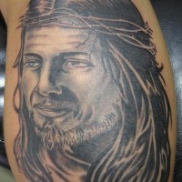 Strange glad Jesus tattoo