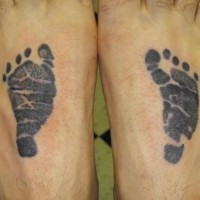 Baby footsteps tattoos on feet