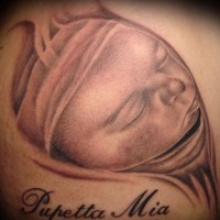 Little newborn face tattoo