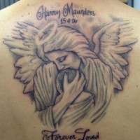 Angel hugging child tattoo on back