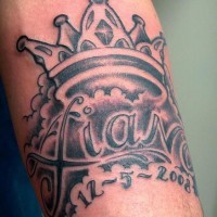 Crown in sky with name tattoo